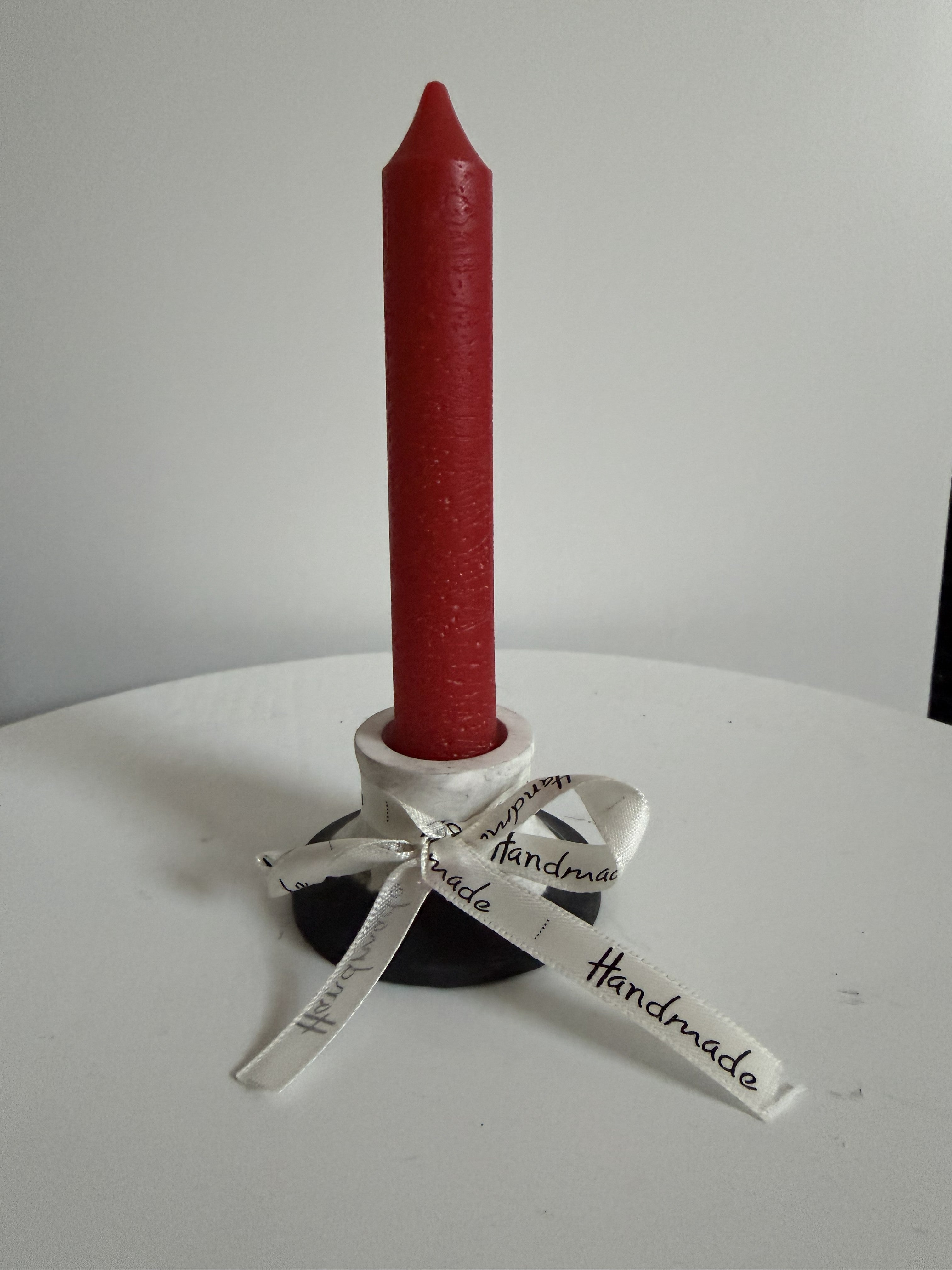 Kerzenhalter mit Kerze
